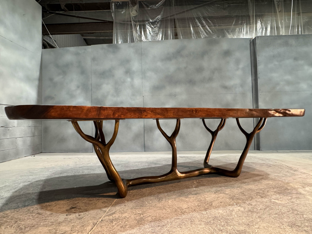Ellipse Shaped Dining Table with Bronze Base by Luxury Interior Designer and Furniture Manufacturer, Mark Alexander