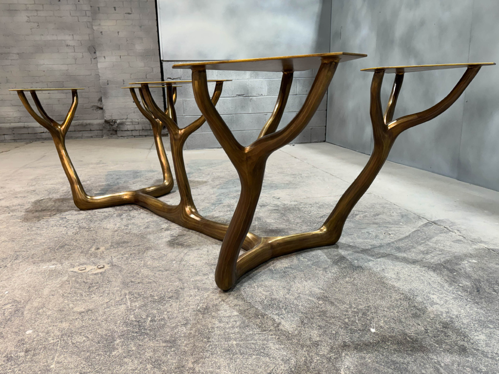Ellipse Shaped Dining Table with Bronze Base by Luxury Interior Designer and Furniture Manufacturer, Mark Alexander